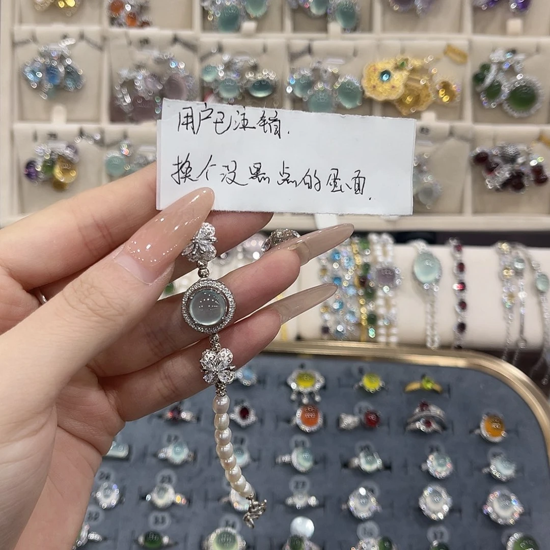 用***销蛇纹石玉银S925镶嵌手链