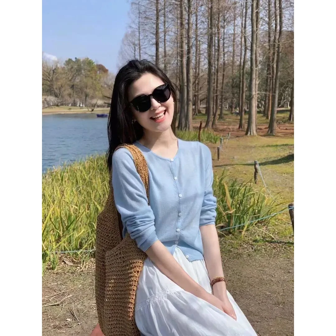 早春穿搭一整套女装2025韩系气质蓝色长袖针织开衫高腰蛋糕半身裙
