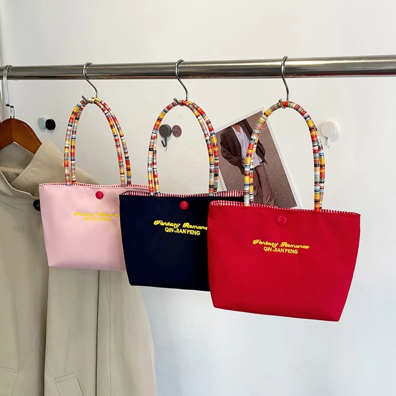 韩系帆布包休闲手提包便携彩绳手提撞色补妆手拎腋下外出单肩包