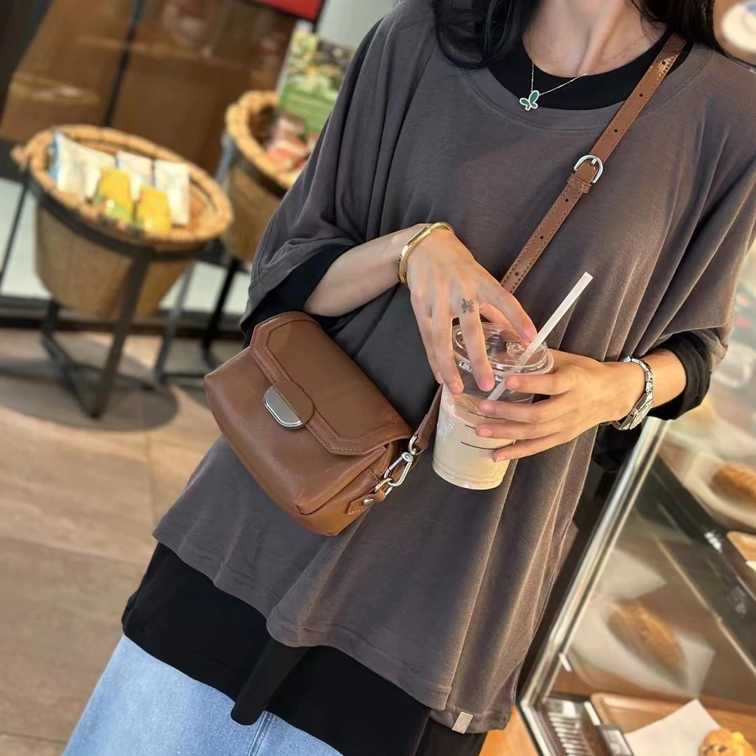 小河家韩系牛皮手机包相机包6099