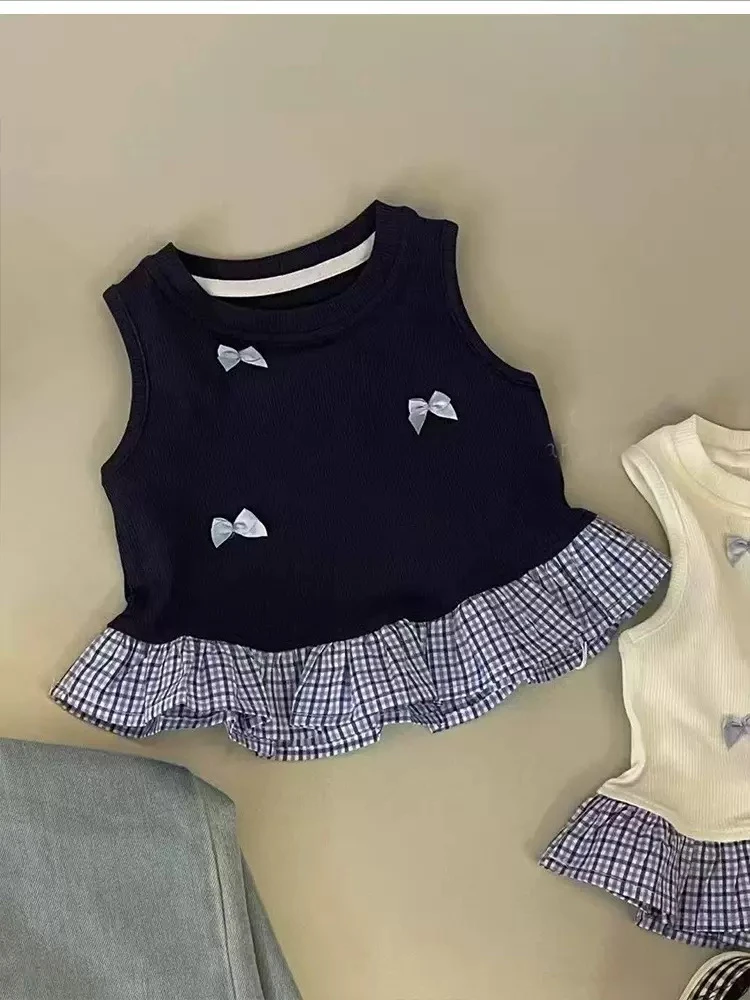 甜美蝴蝶结拼接格子花边上衣