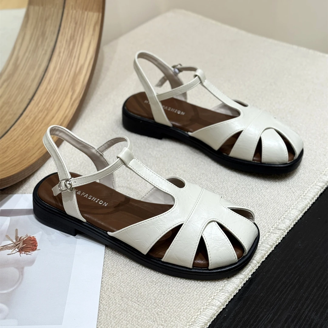 韩版编织后空百搭包头凉鞋女2025新款夏季复古沙滩平底镂空罗马鞋