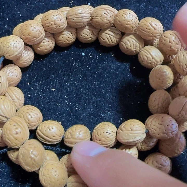 15号野生桃核脖挂54颗