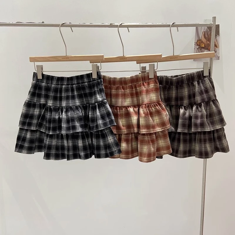 格子毛呢半身裙秋冬2025新款高腰A字裙蓬蓬蛋糕裙辣妹显瘦超短裙