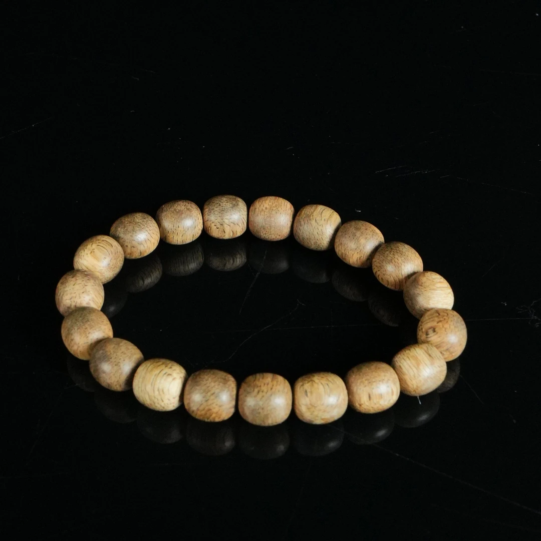 DY-B1693 文莱黑油铁结软丝沉香桶珠 1.06x1.15cm 9g