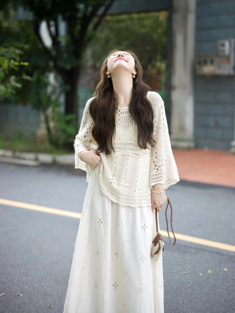 早春搭配一整套法式慵懒钩花针织罩衫白色提花a字半身裙两件套女
