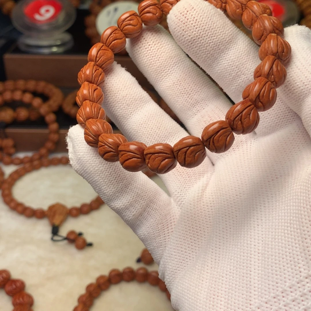 桃核手串?****达秦岭龙纹桃核