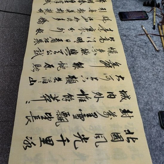 书法张老师现场手写沁园春雪书法