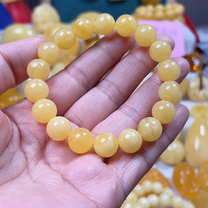 蜜蜡裸石未镶嵌精选鸡油黄圆珠手串