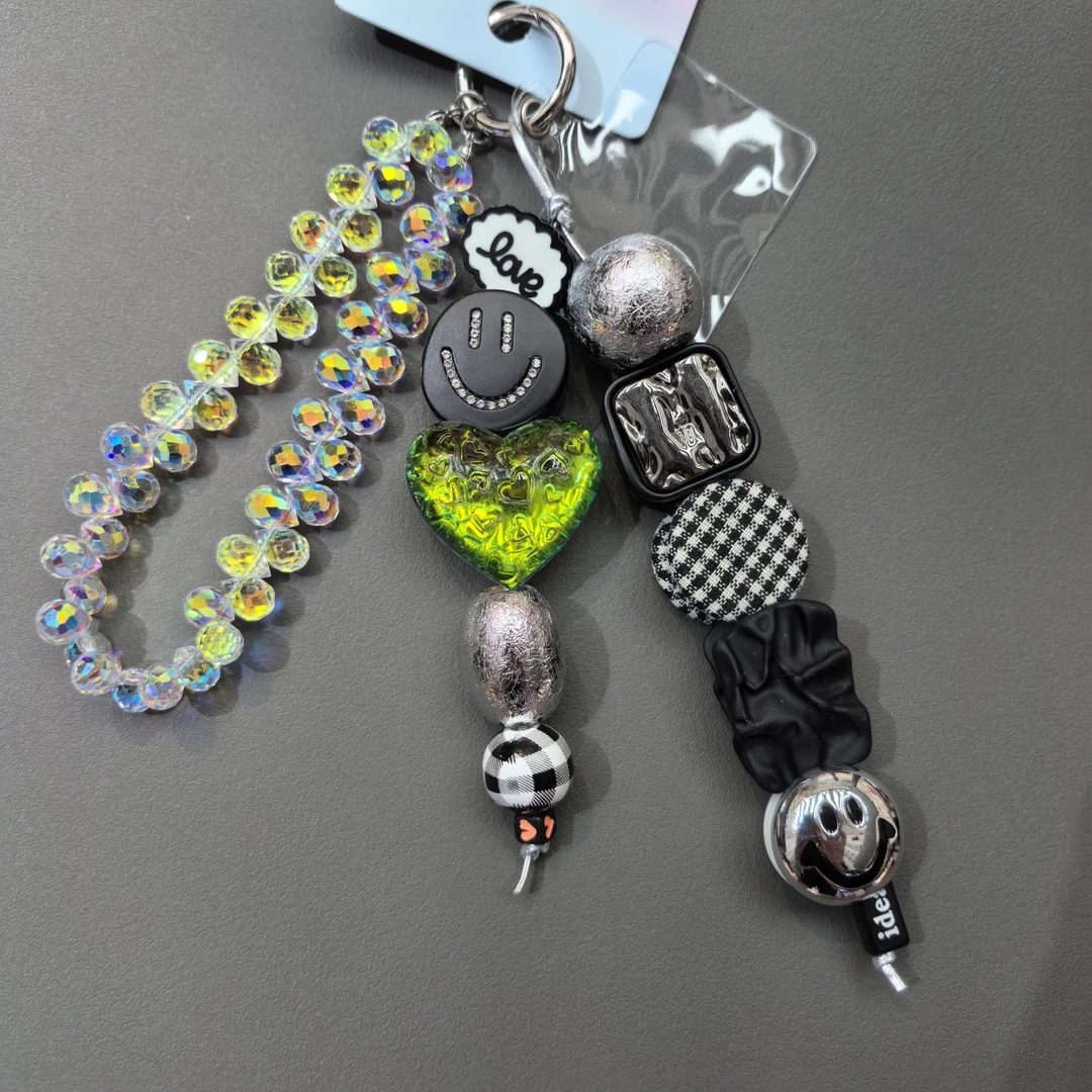 D425黑色笑脸炫彩爱心水水包挂件