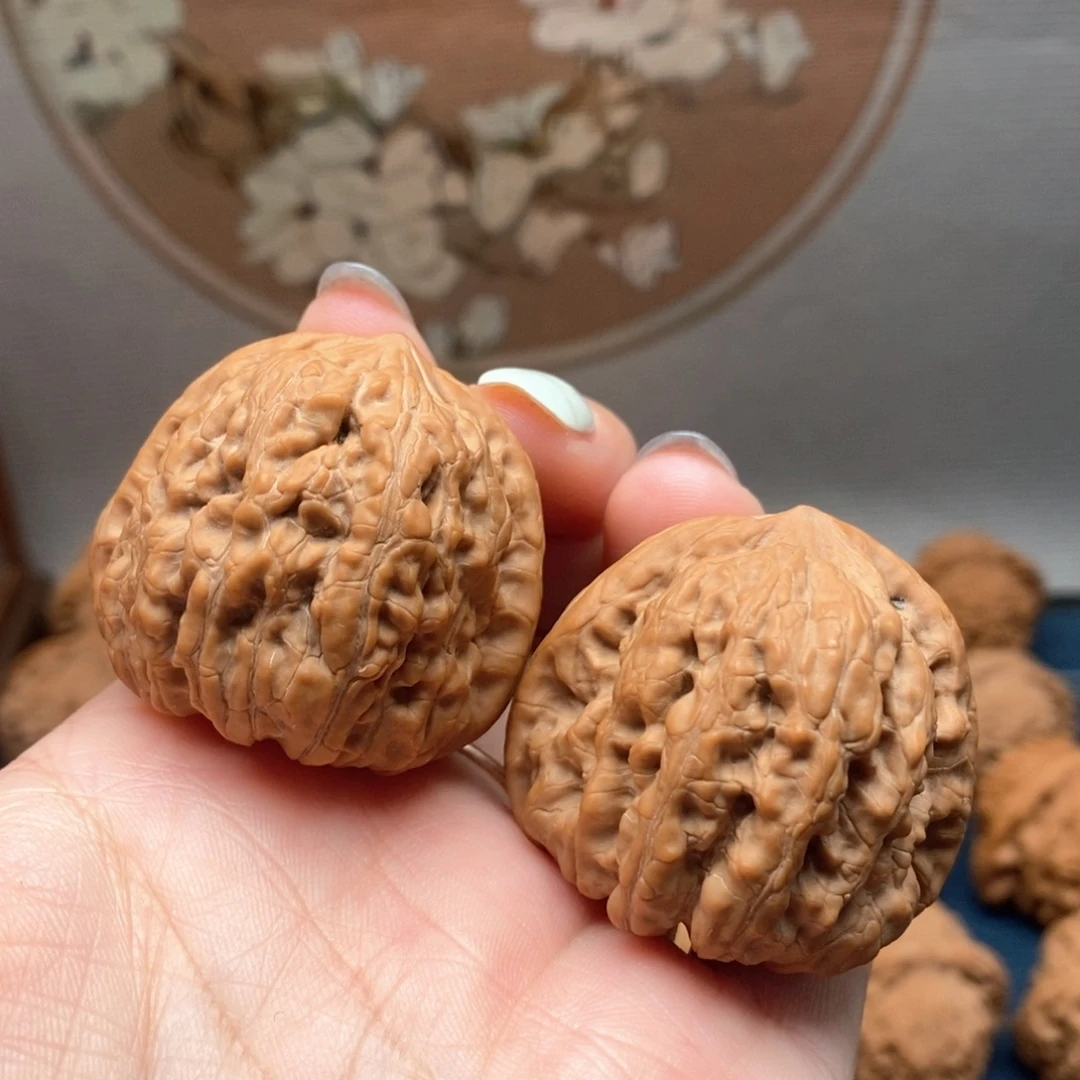 山***尔文玩核桃把件8平谷凹底38