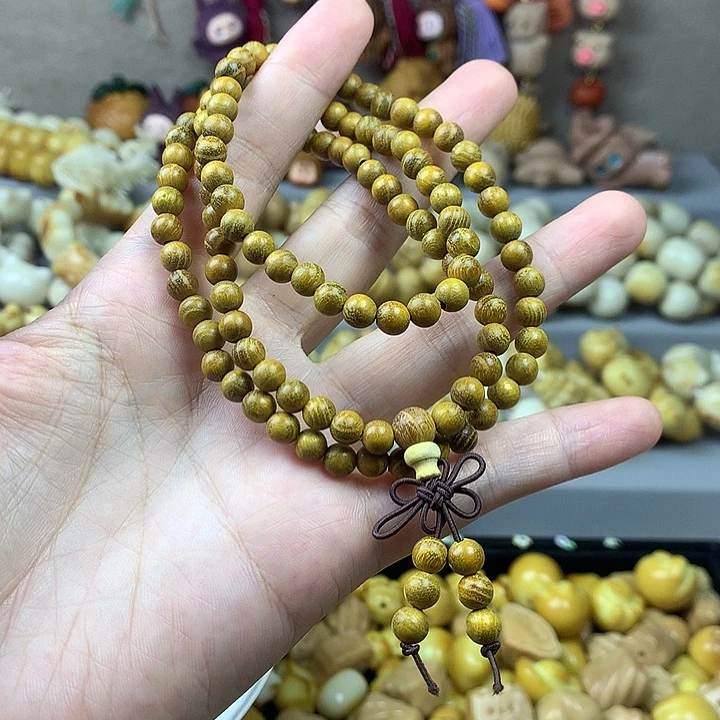 D***⁶吊坠菩提根/象牙果木质0.6微瑕108颗