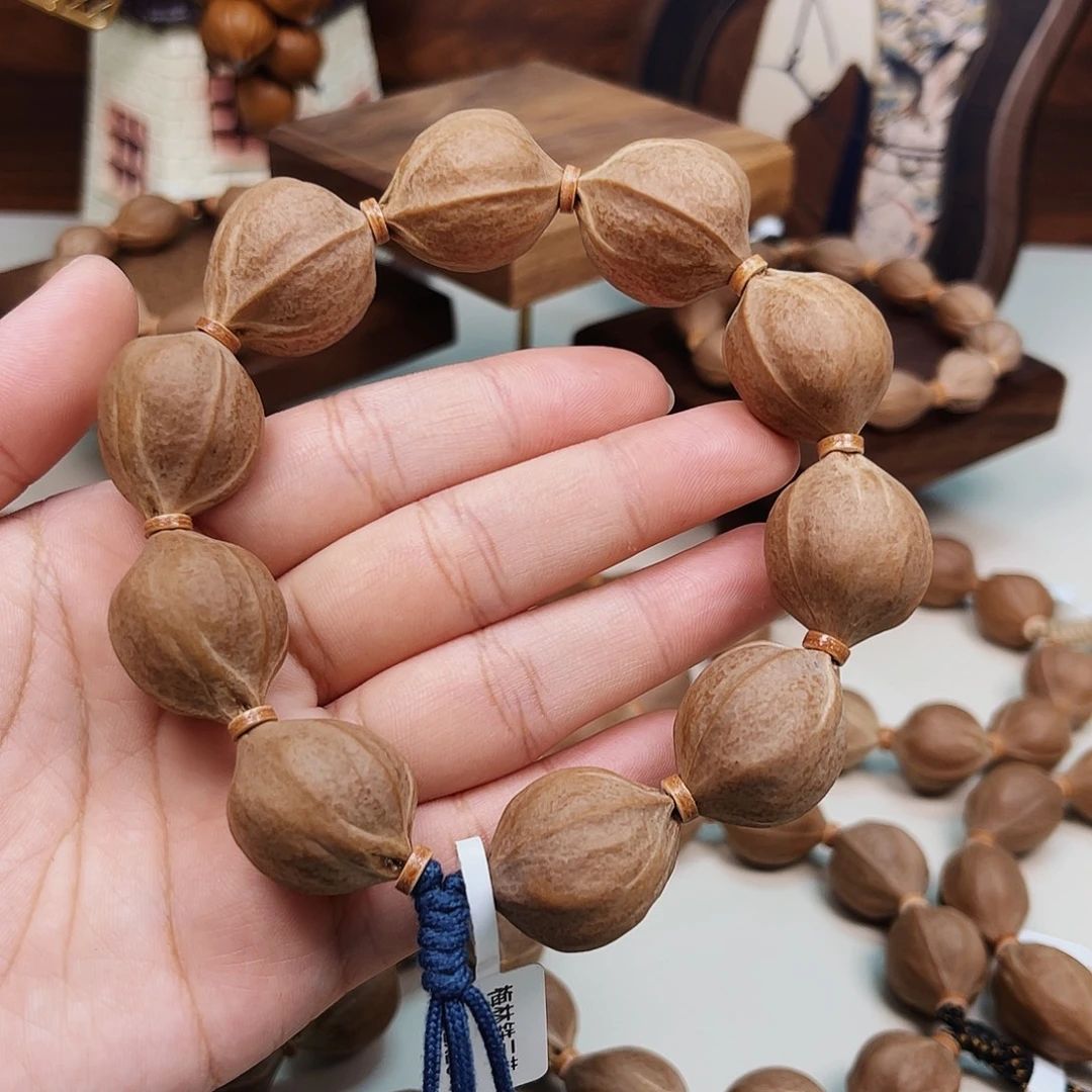 洋***钉手串橄榄核梅林铁核2226