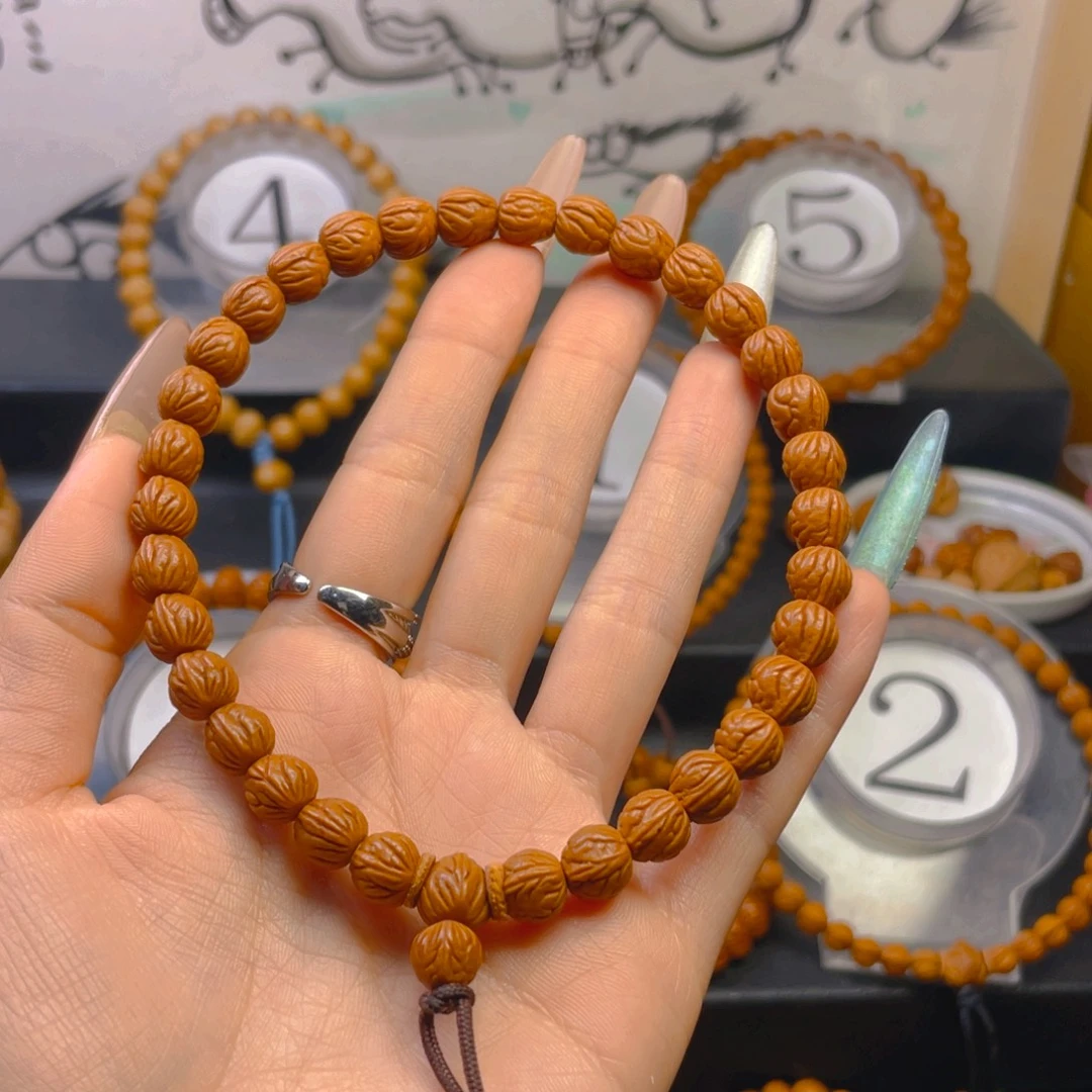 暖***暖桃核吊坠0.88888888888