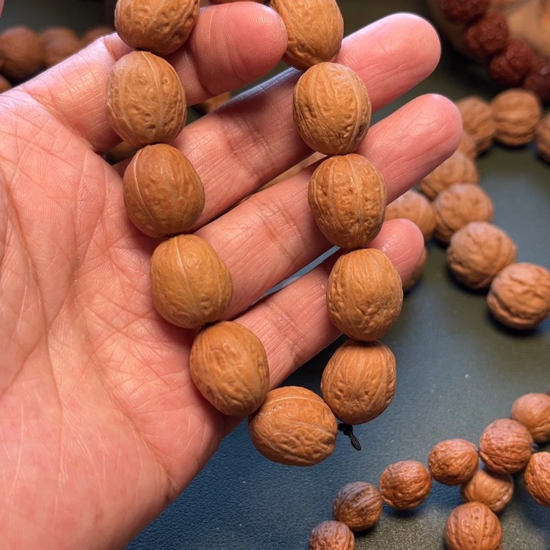 桃核吊坠海****来精品秋子手串