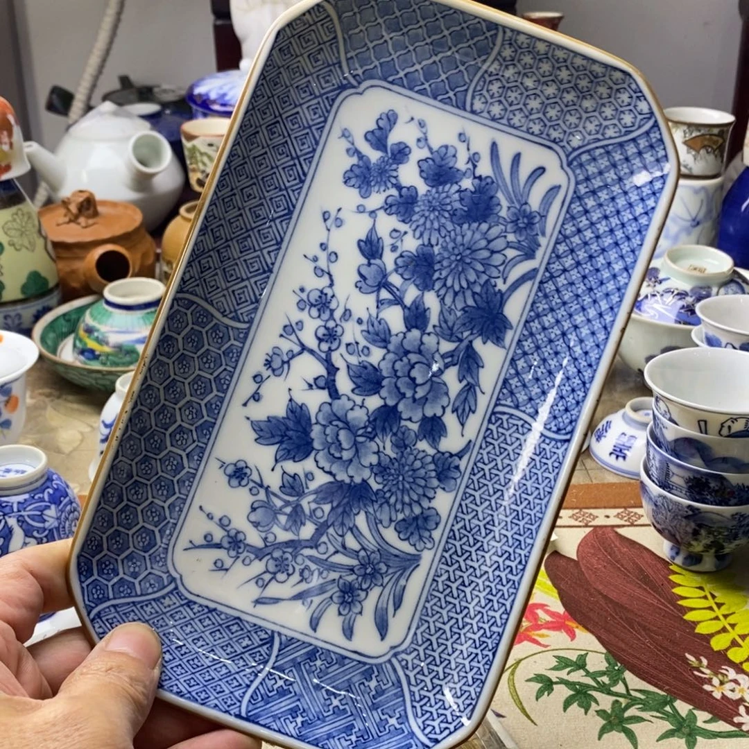 瓷片飞山一浪归水流来不去