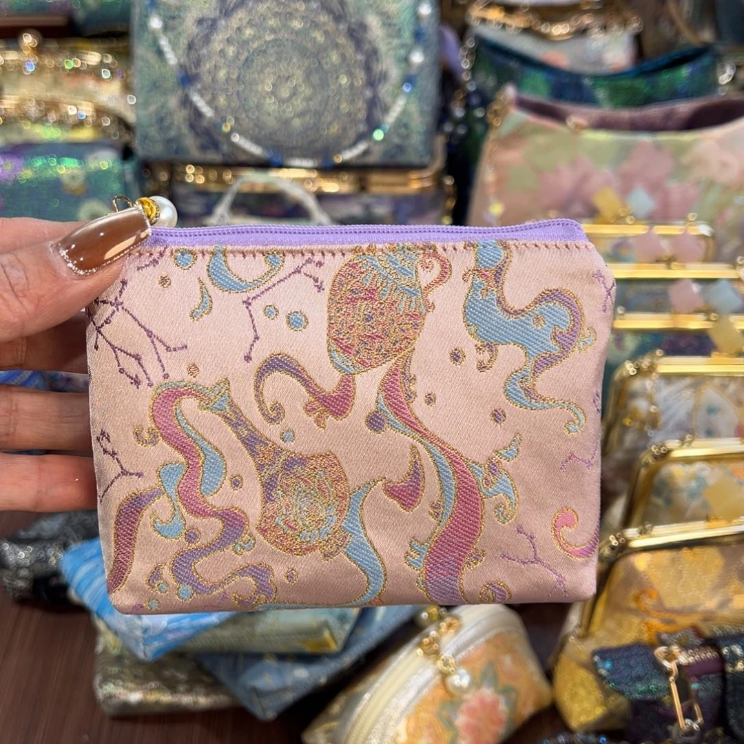 亿****蚕丝星座拉链零钱包