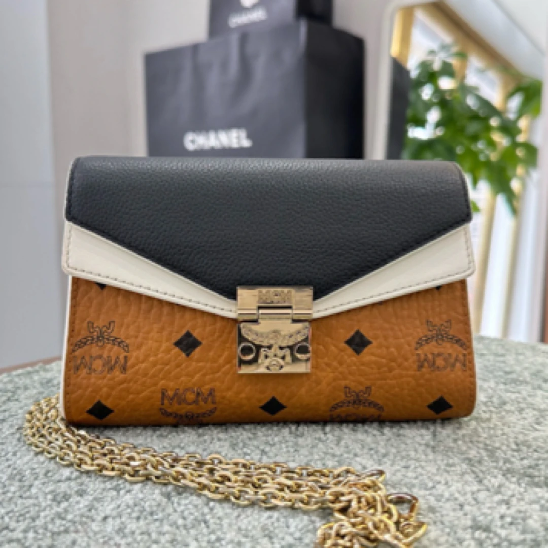99新 MCM 98新MCM拼色邮差链条包，现货好价得