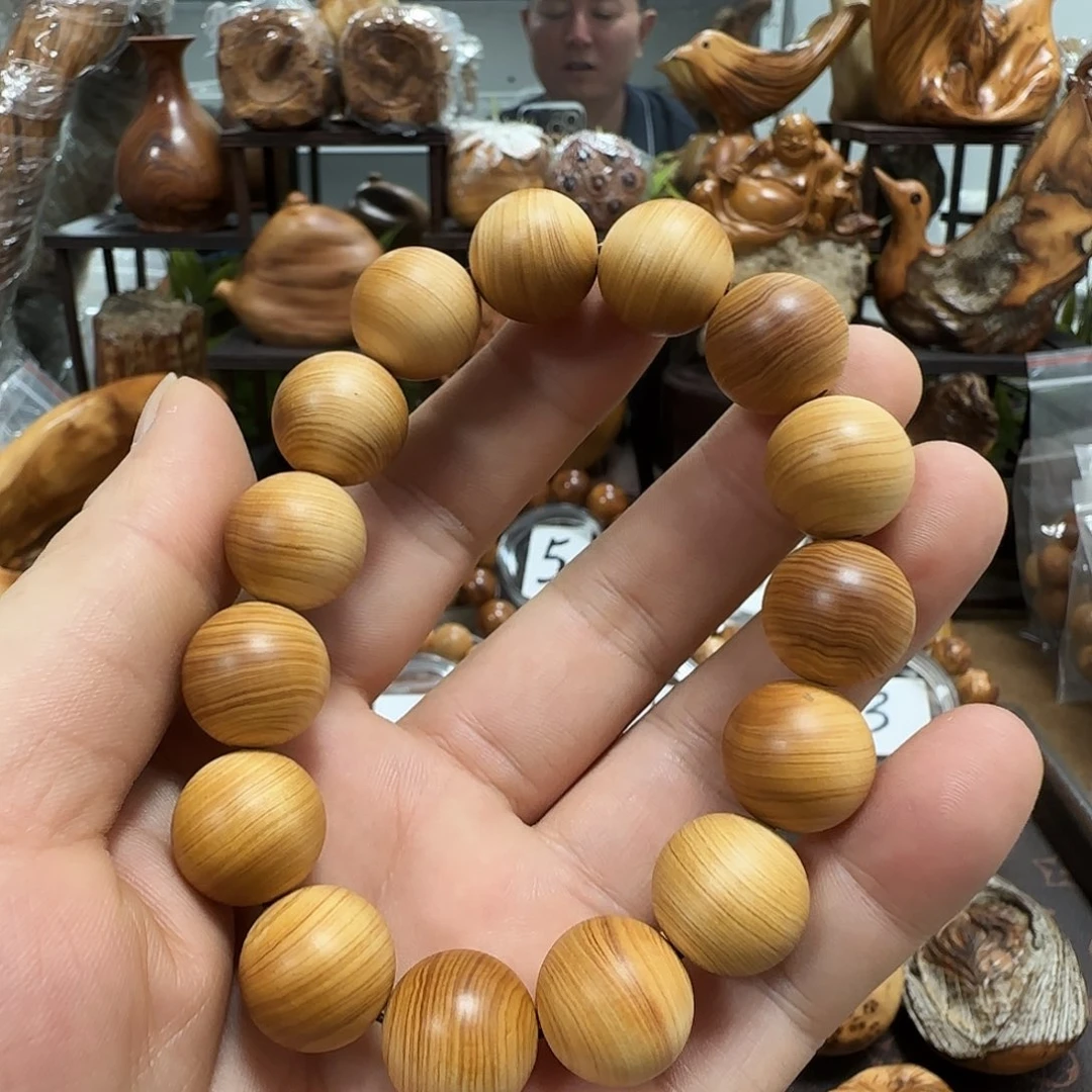 如***Y柏木（崖柏）太行陈化骨料鸡油黄1.5手串
