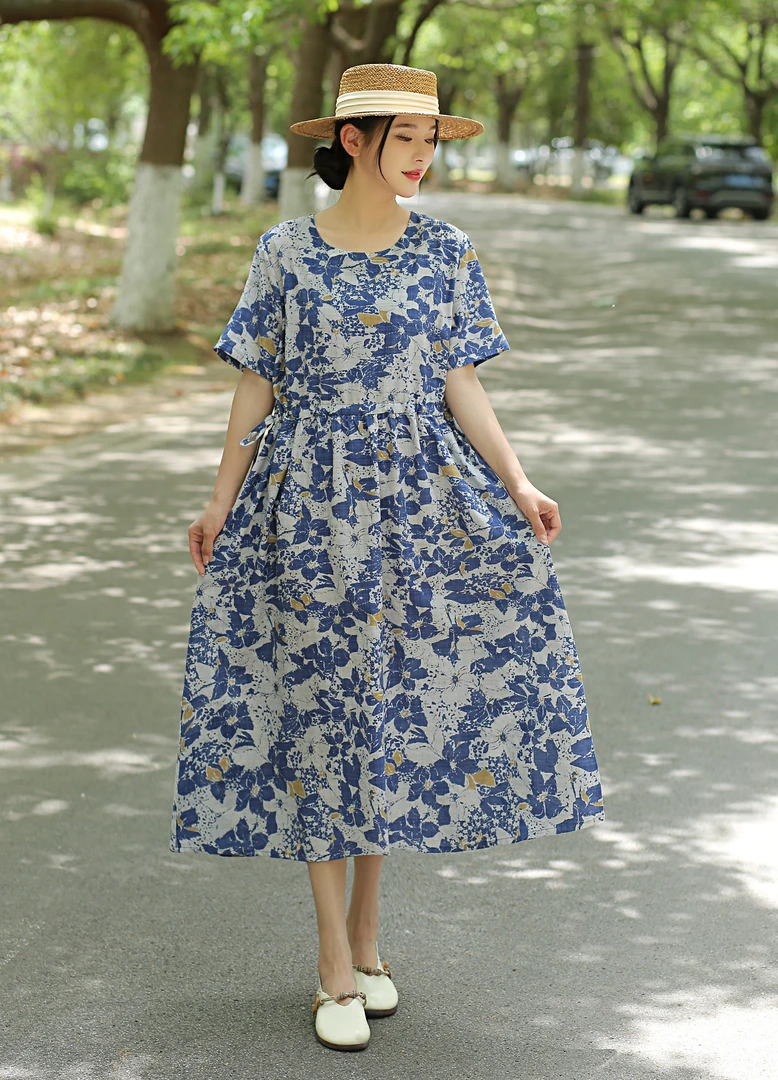 夏季新款印花宽松收腰显瘦碎花大摆气质复古过膝中长款连衣裙大码