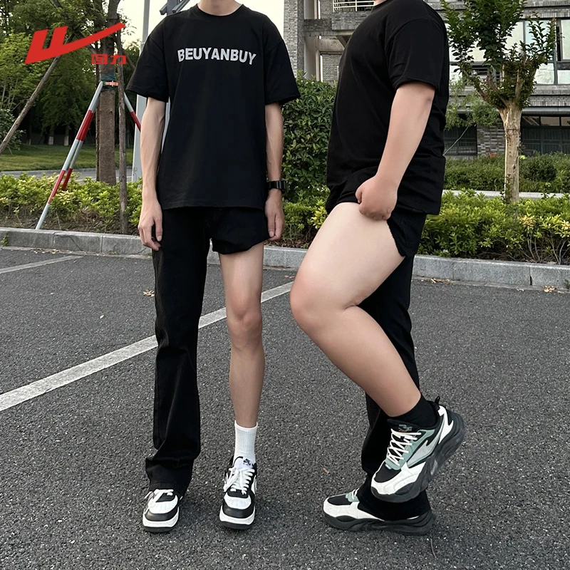 回力517黑色弯刀牛仔裤男弹力微喇直筒裤春夏秋季腿粗显瘦裤子