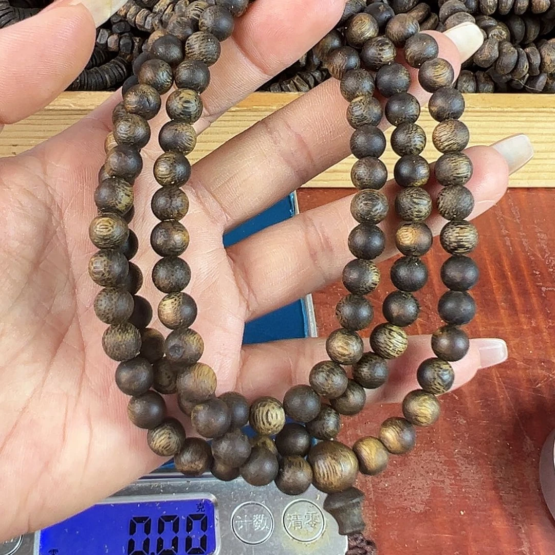 沉香碎屑沉香卡7圆珠多圈22.9g沉浮乌身老料