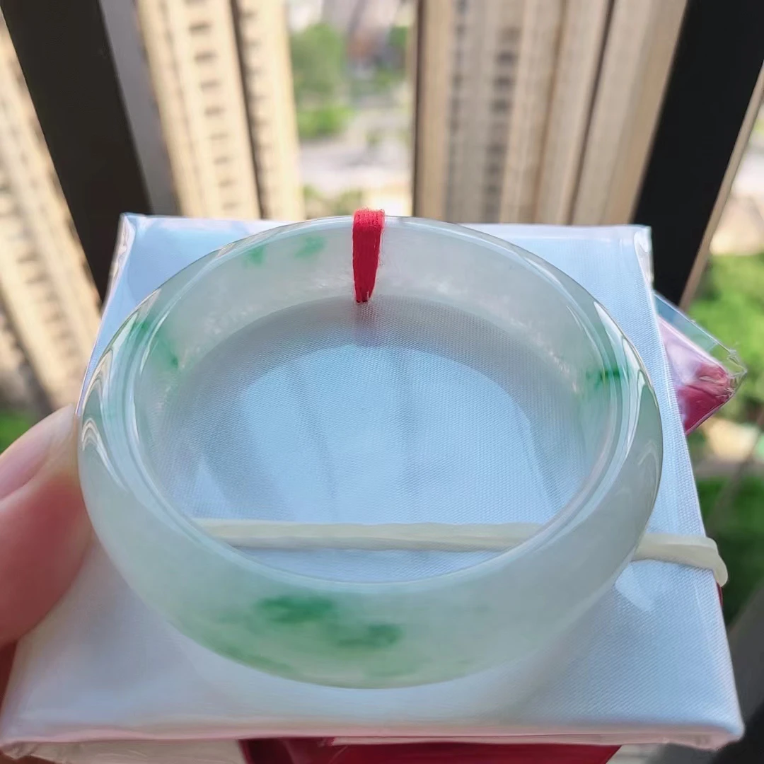 50.8正圈糯冰飘阳绿花翡翠手镯,种老冰透水润。