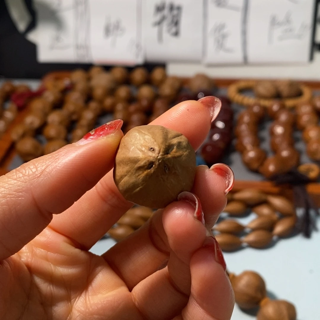 橄榄核手串辰*子2.3精品4花3通