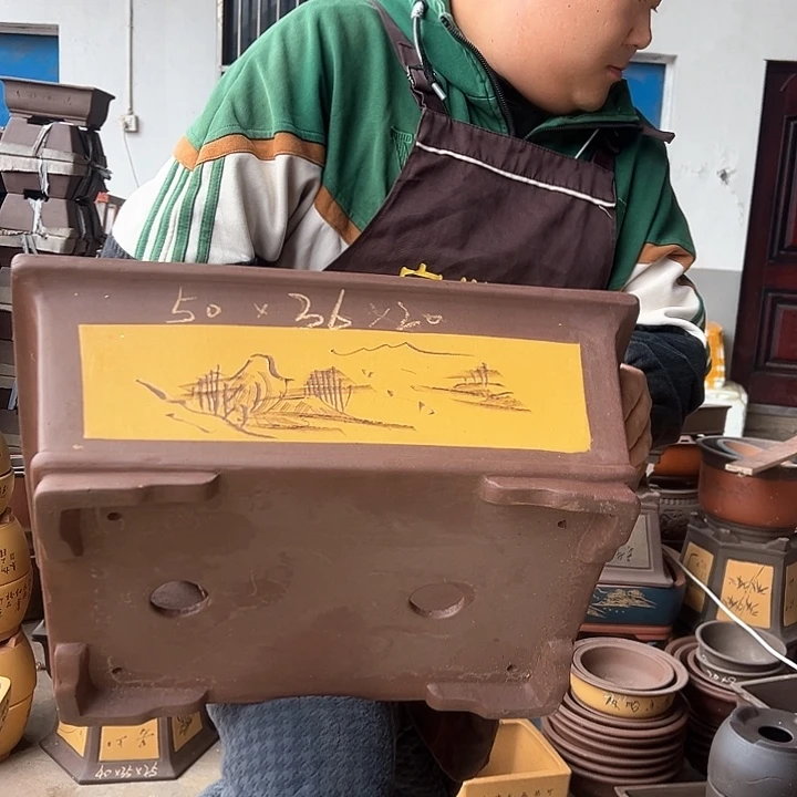 紫砂花盆不好意思我没在公司