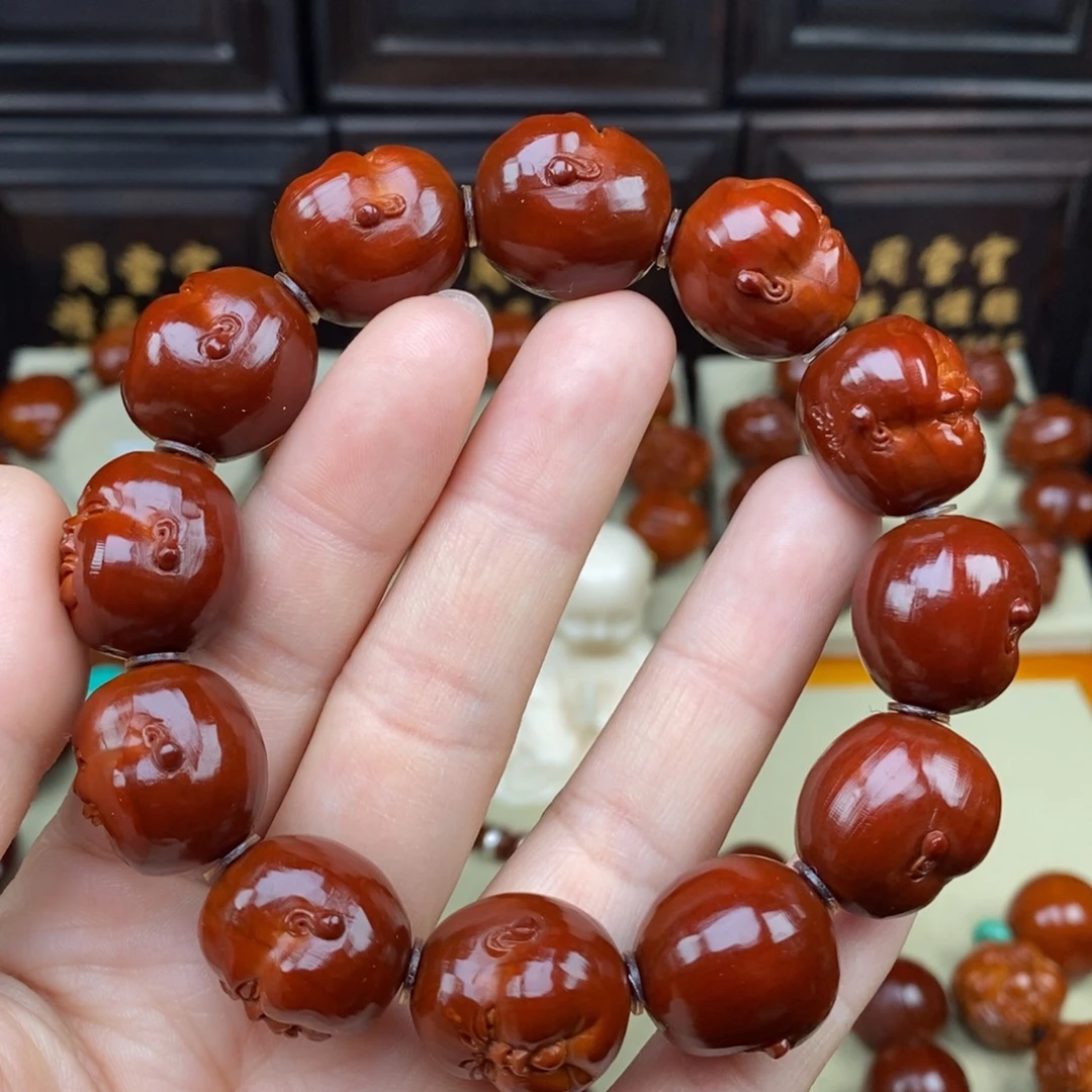 橄榄核吊坠人生百态