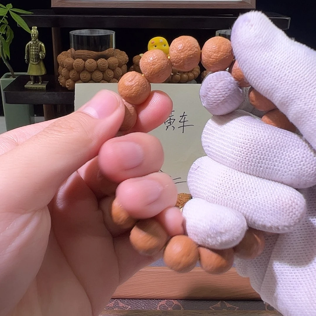 莓***恼猴头核桃吊坠微微瑕砂糖橘