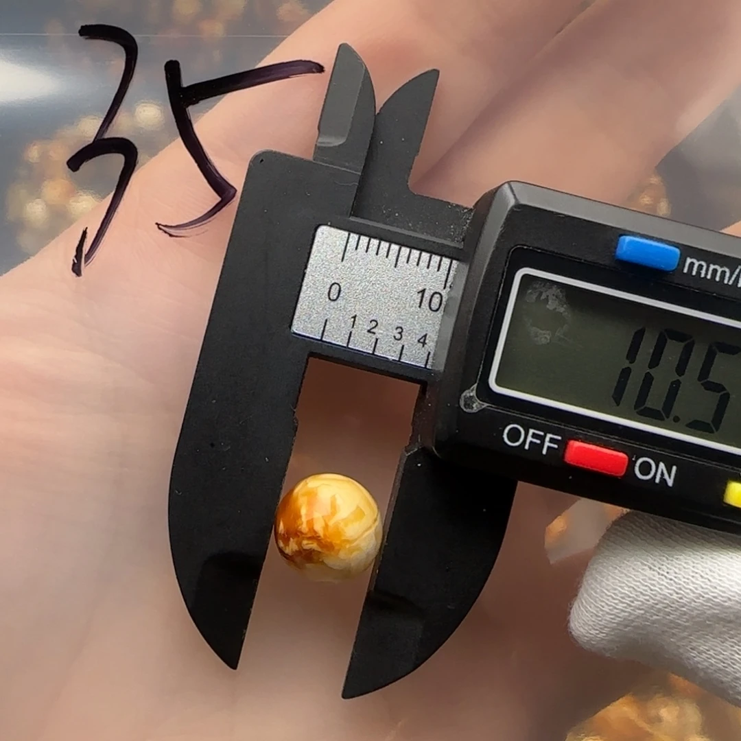 琥珀裸石未镶嵌李**?琥珀蜜蜡