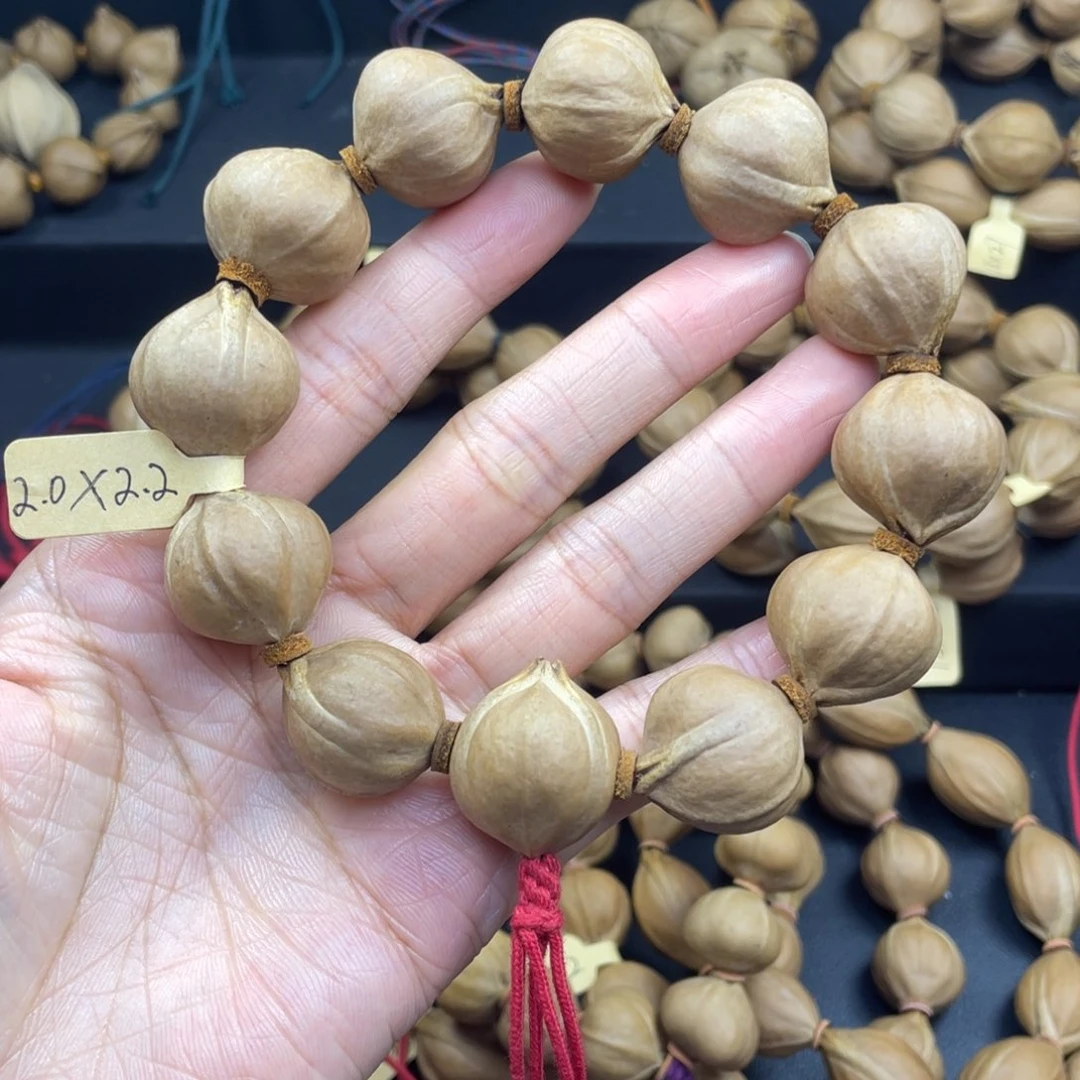 *****001橄榄核三花20*22