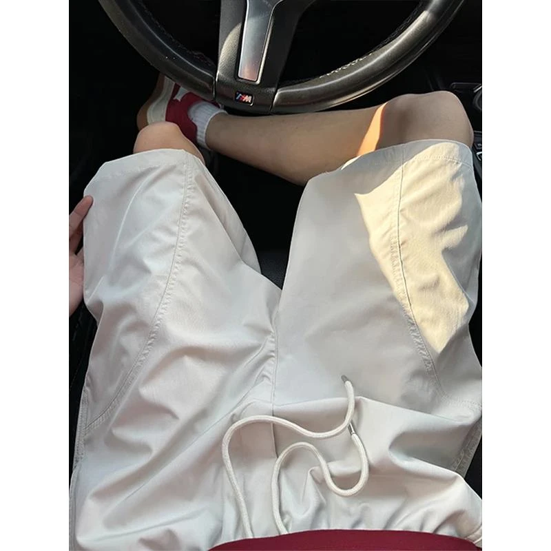 米白色尼龙速干短裤男夏季外穿美式斜切休闲运动裤子冰丝四五分裤