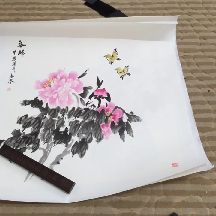 国画花鸟等图案为一体而得名