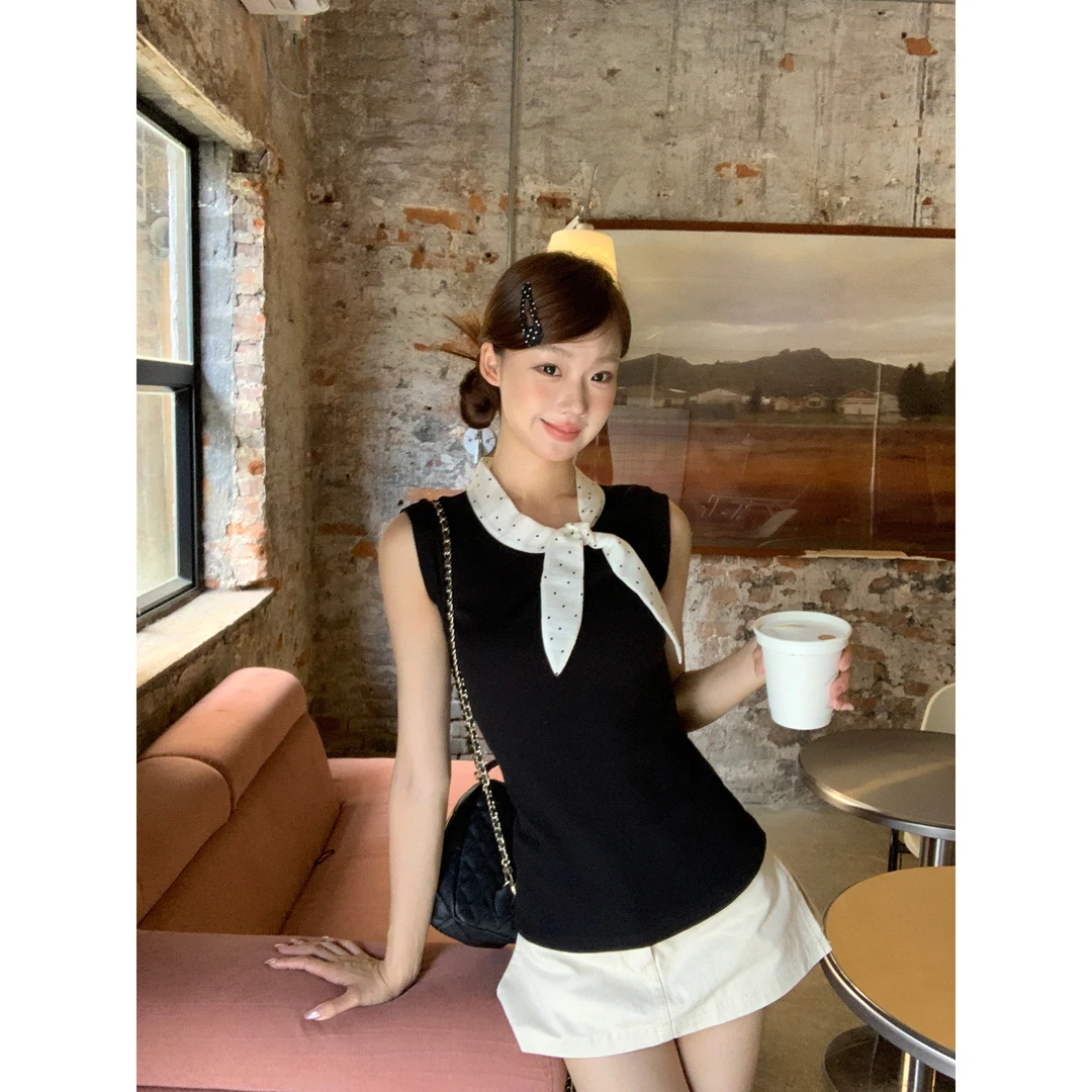 2025年夏季新款小众侧领无袖蝴蝶结波点通勤穿搭背心修身显瘦上衣