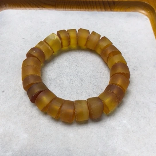 蜜蜡裸石未镶嵌叁*柒手串