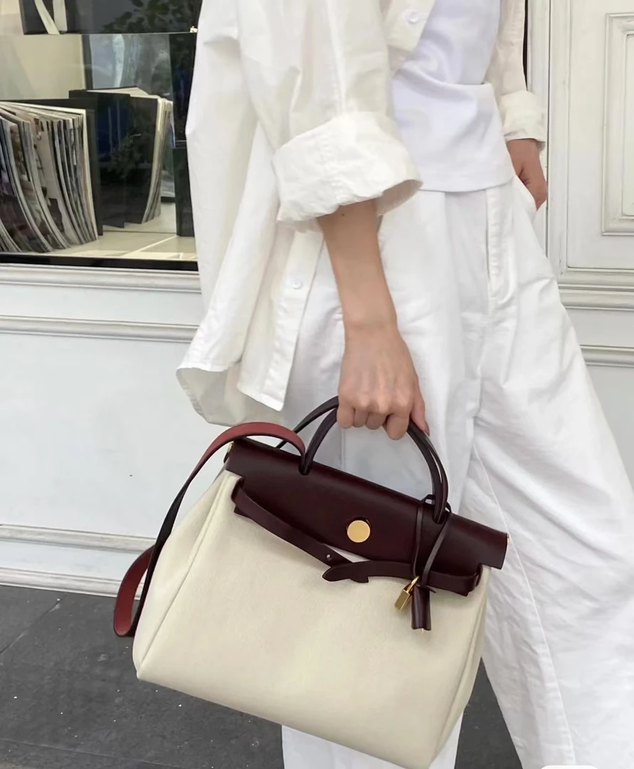 95新 Hermes/爱马仕 herbag31水泥灰拼马鞍红银扣单肩包/45538324