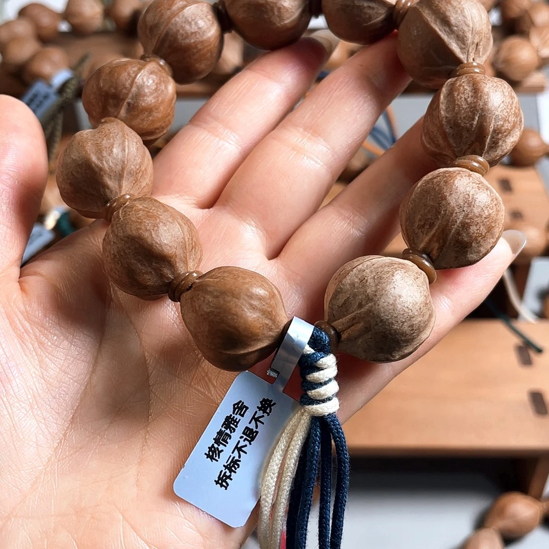爱***_橄榄核手串/手链20/23梅林铁核