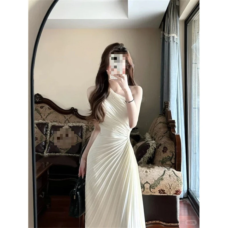 性感纯欲气质名媛风斜肩无袖连衣裙女装夏季露腰显瘦不规则长裙新