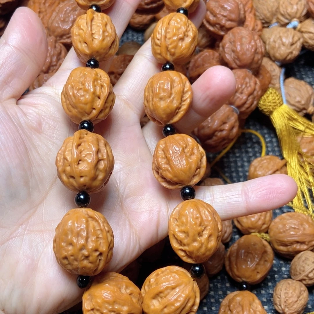 吊坠桃核官帽手持