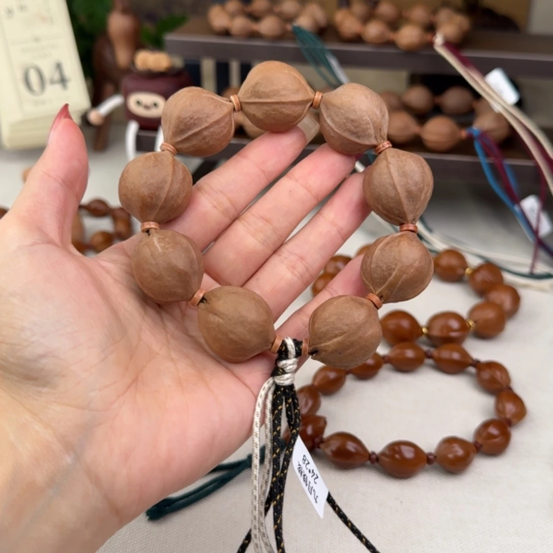 六***)橄榄核手串2428三花核串（下）