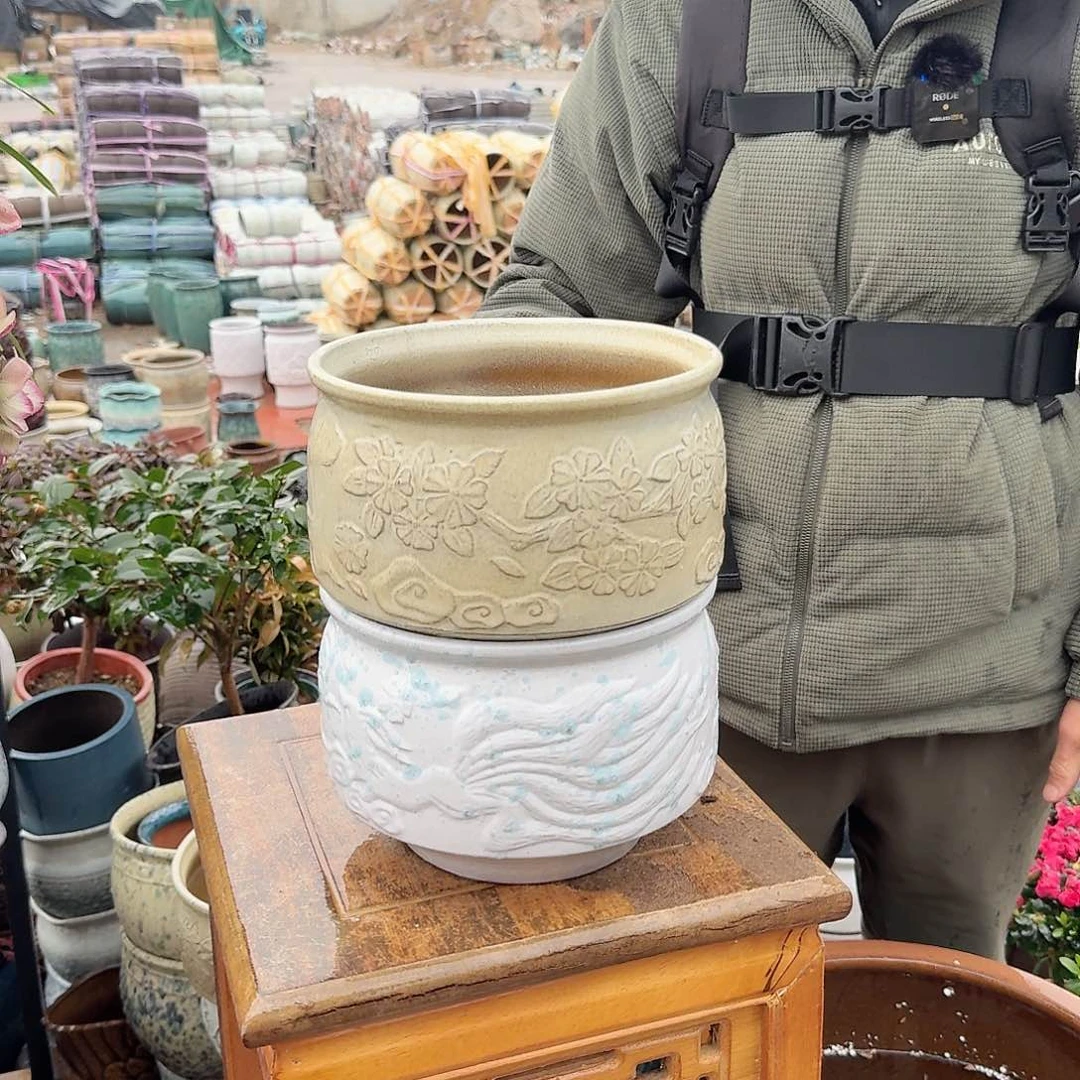 紫砂花盆口20高15（两个九尾狐拼