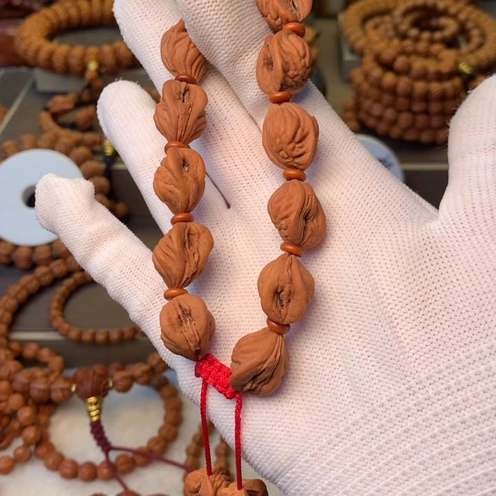 得***命桃核手串秦岭龙纹