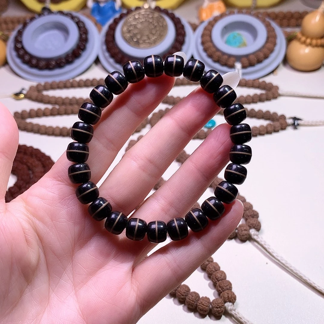 吊坠文玩核桃黑金椰蒂一线天