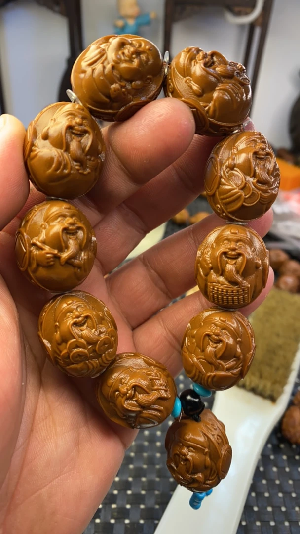 妙女2.2财迷雕刻手串黄金树上黄金核不是橄榄核黄金核雕刻手串