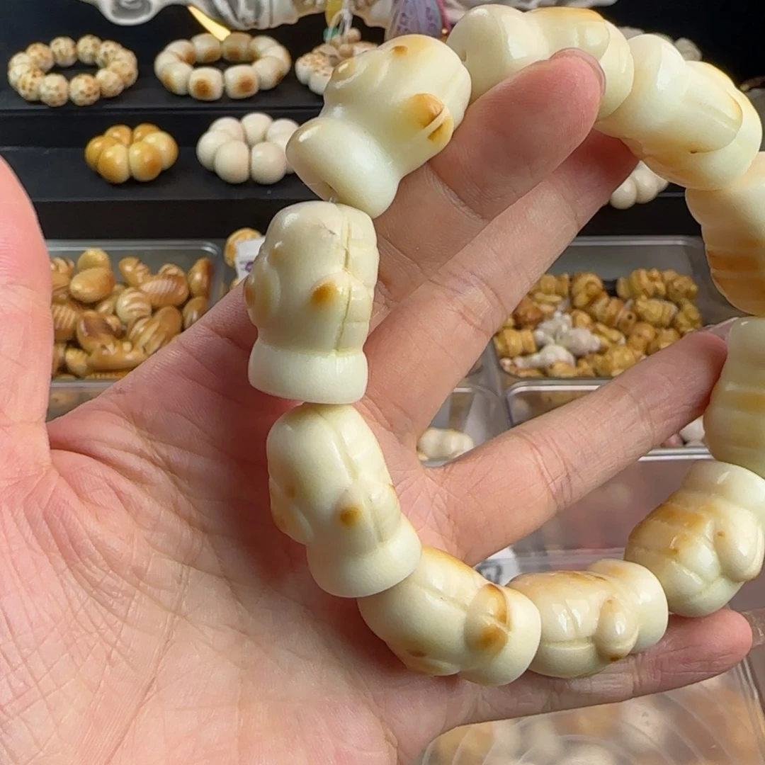 吊坠菩提根/象牙果微瑕牙果小熊手套1串有一颗侧面裂