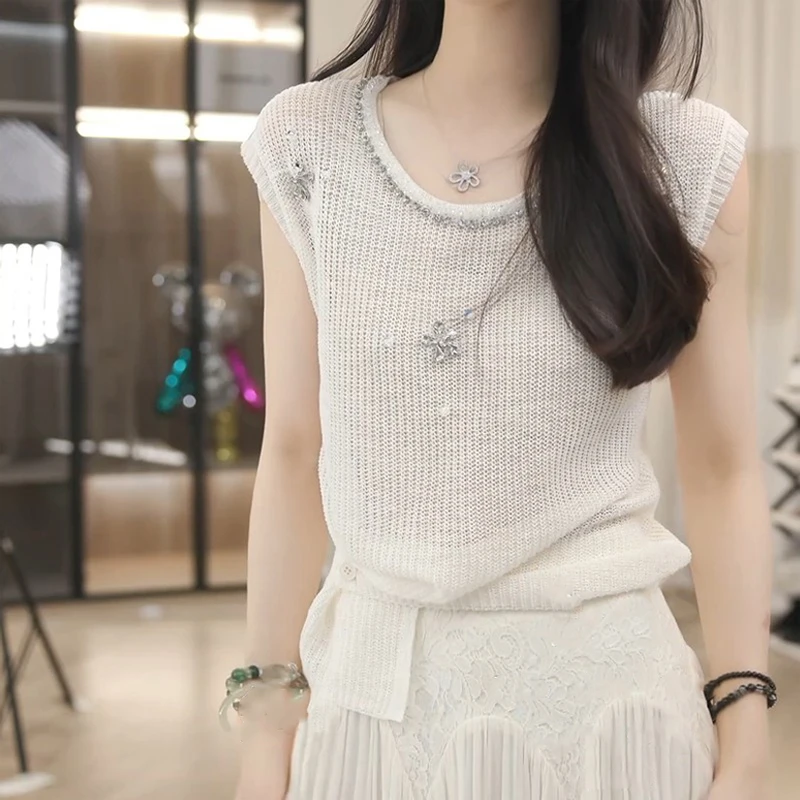 设计感简约上衣2025夏季新款高级感钉珠镂空针织衫短袖