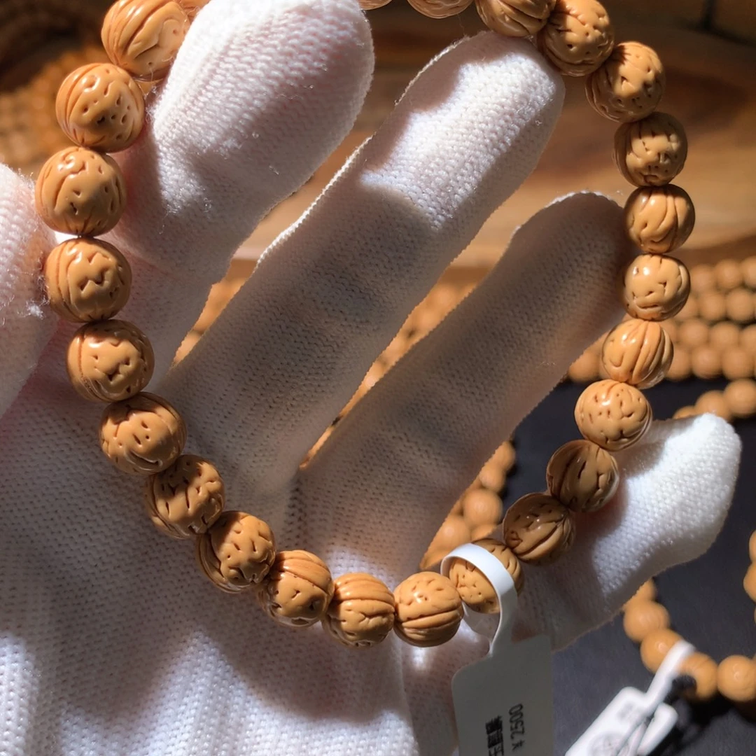 趙***儿桃核手串玉麒麟9尺寸桃核