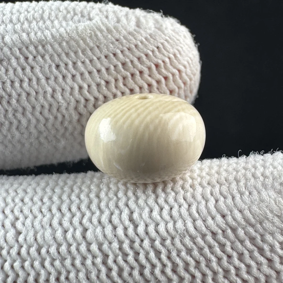 K4453天然猛犸牙瑕疵特价11.5*7.7mm一物一图 假一罚十